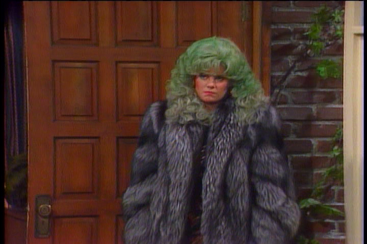 Blair enters. Her hair is green.